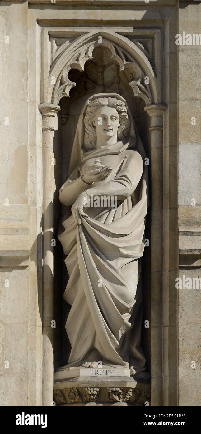 London, UK. Allegorical statue on the facade of Westminster Abbey representing Truth Stock Photo