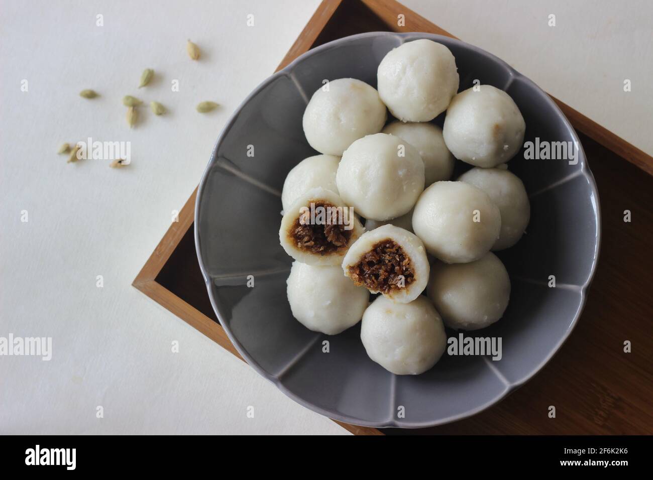 Steamed dumplings made with rice flour dough and stuffed with a filling of coconut and jaggery
