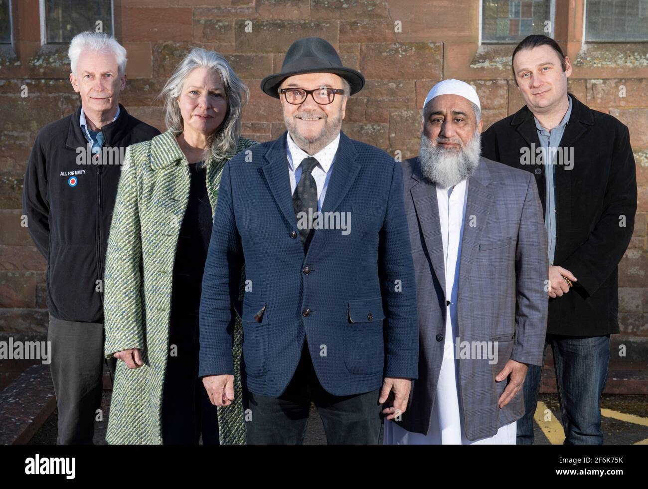 Scone, Perth, Scotland, UK. 1st Apr, 2021. PICTURED: (L-R) Brian Henderson; Linda Holt; George Galloway; Imam Manzoor Khan; James Glen who are all Candidates for Mid Scotland and Fife regional list vote. Exclusive images of George Galloway, Leader of the All For Unity Party. George Galloway is a British Politician, Broadcaster and writer. He currently presents the Mother of all Talk Shows on Radio Sputnik and Sputnik on RT UK. He is photographed for his official Party portrait for the 6th May Scottish Parliament Holyrood Elections. Pic Credit: Colin Fisher/Alamy Live News Stock Photo