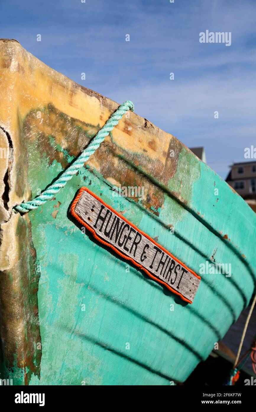 A boat named 'Hunger and Thirst' at Peggys Cove in Nova Scotia, Canada. Stock Photo
