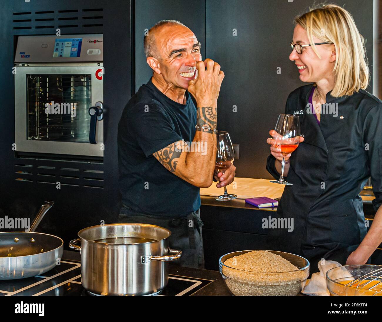 Cooking with a bite: Giulio knows what he's talking about. Foraging the wild asparagus means collecting a delicacy in Tuscany, Italy. It is precious and rare like truffles Stock Photo