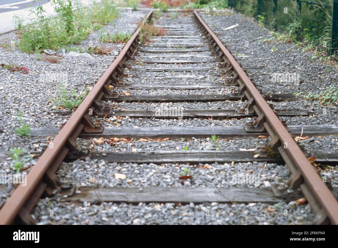 Old disused railway track in Trafford Park Stock Photo