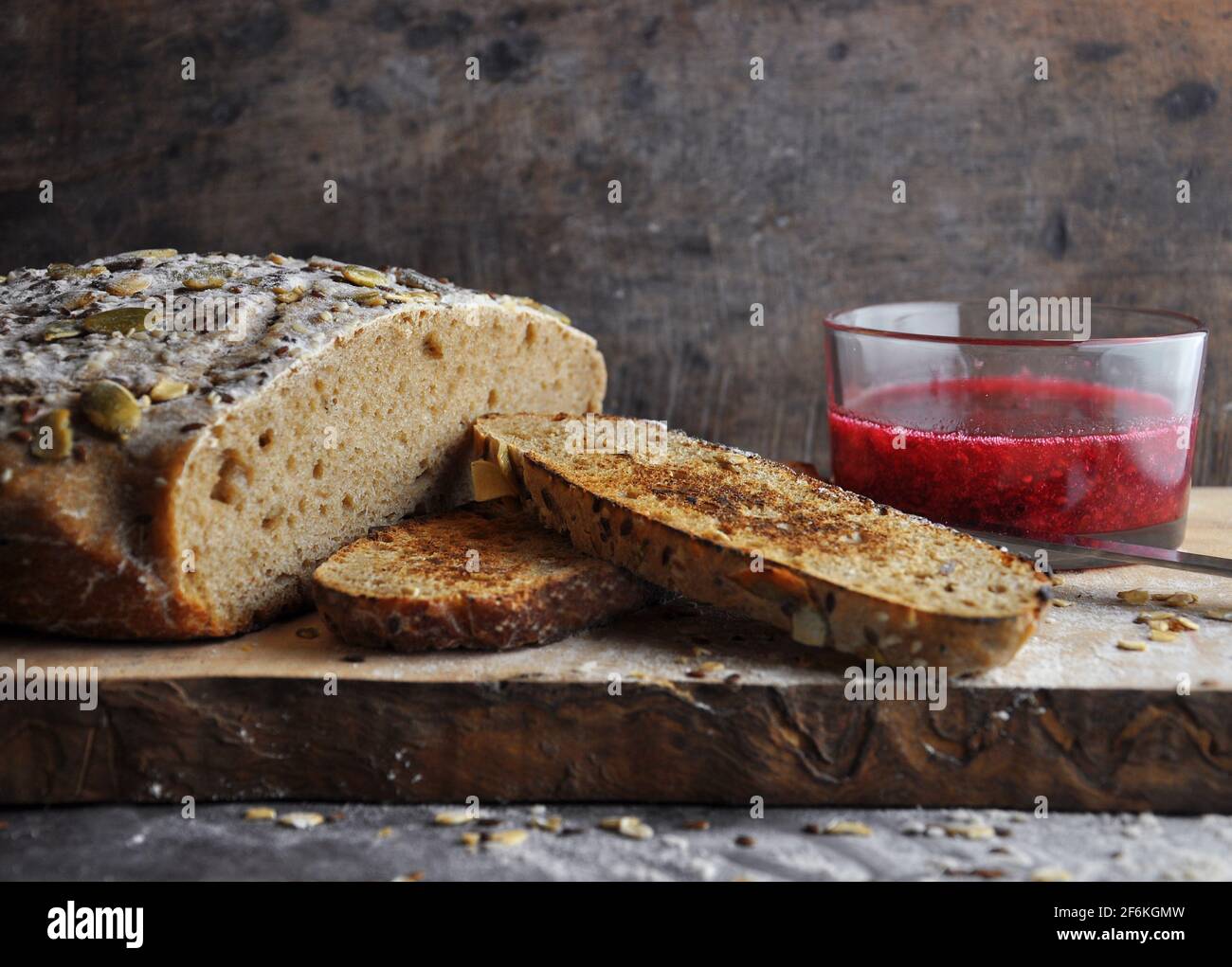 Sliced bread with raspberry jam.Tasty and healthy breakfast Stock Photo