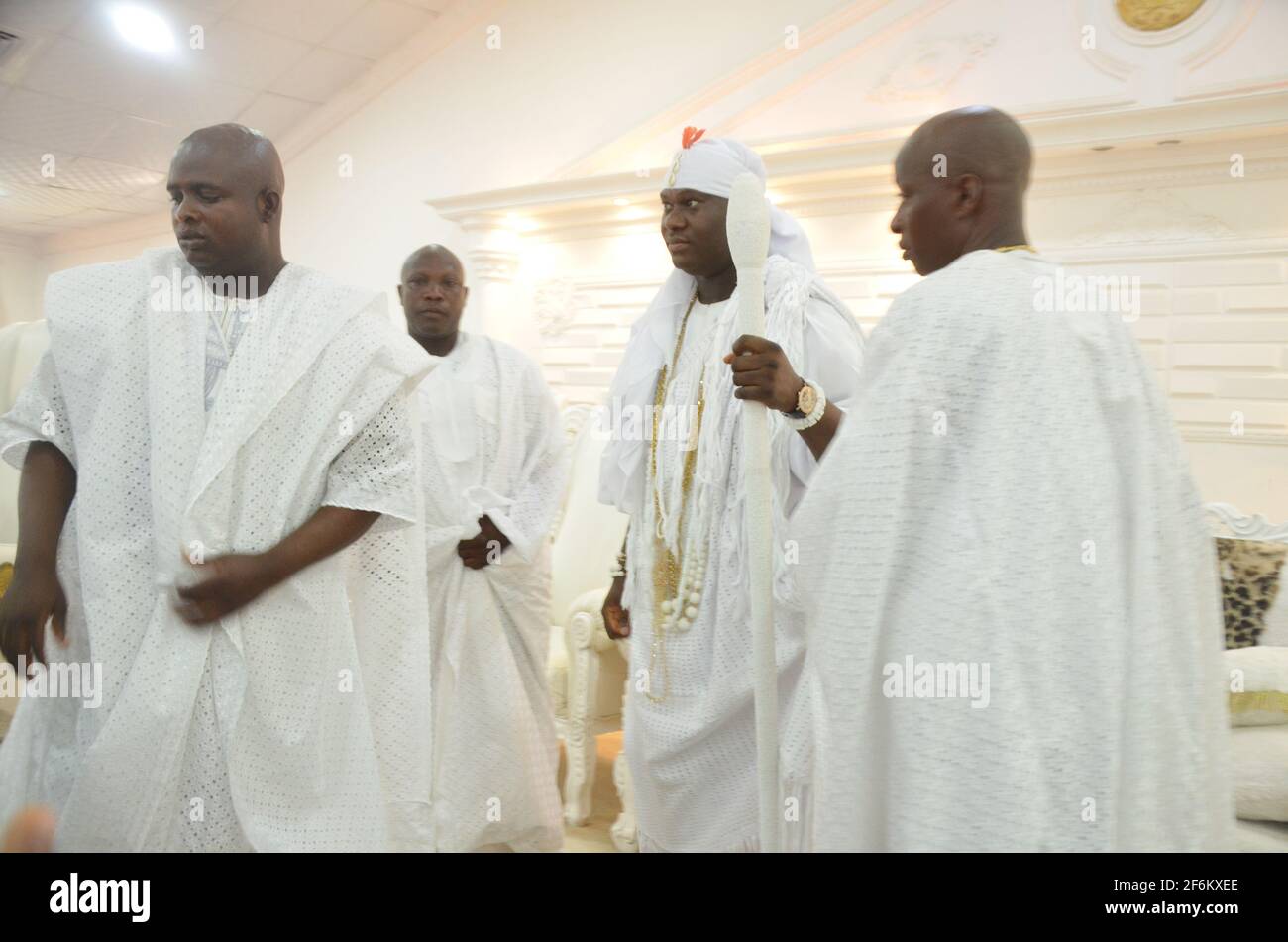 Ooni of Ife, Oba Adeyeye discussing with his palace chiefs (Emese) after seven-day seclusion to commune with the ancestors during the Olojo Festival. Stock Photo