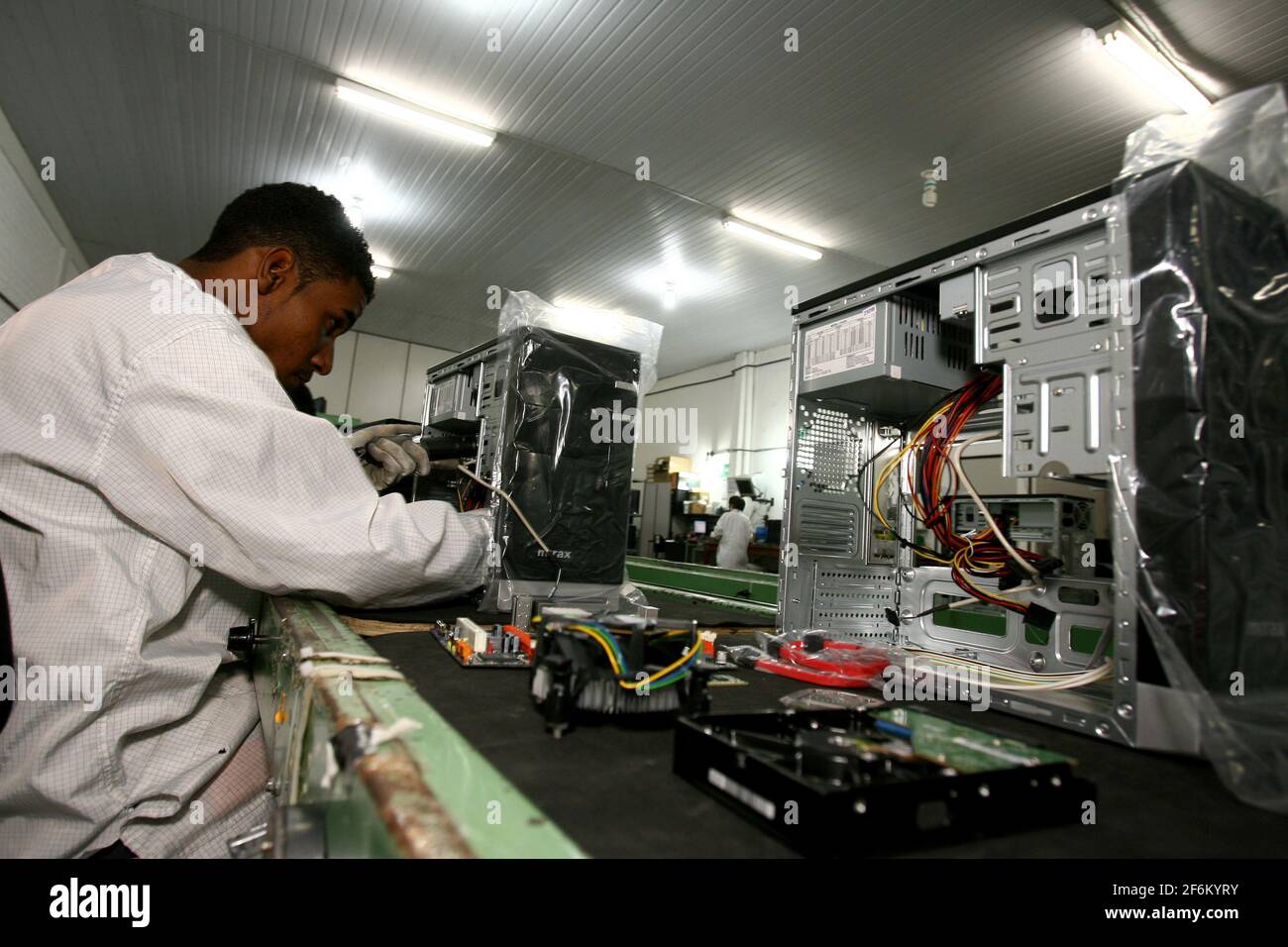 ilheus, bahia / brazil - june 13, 2011: workers are seen on a computer ...