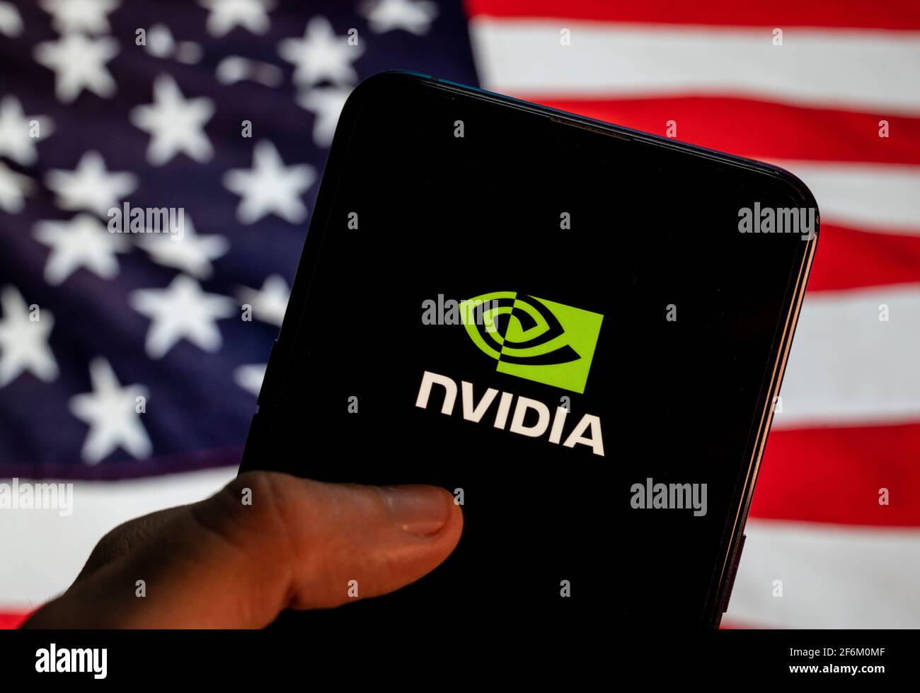 In this photo illustration the American graphics processing technology and  semiconductors company Nvidia logo is seen on an Android mobile device with  United States of America (USA), commonly known as the United