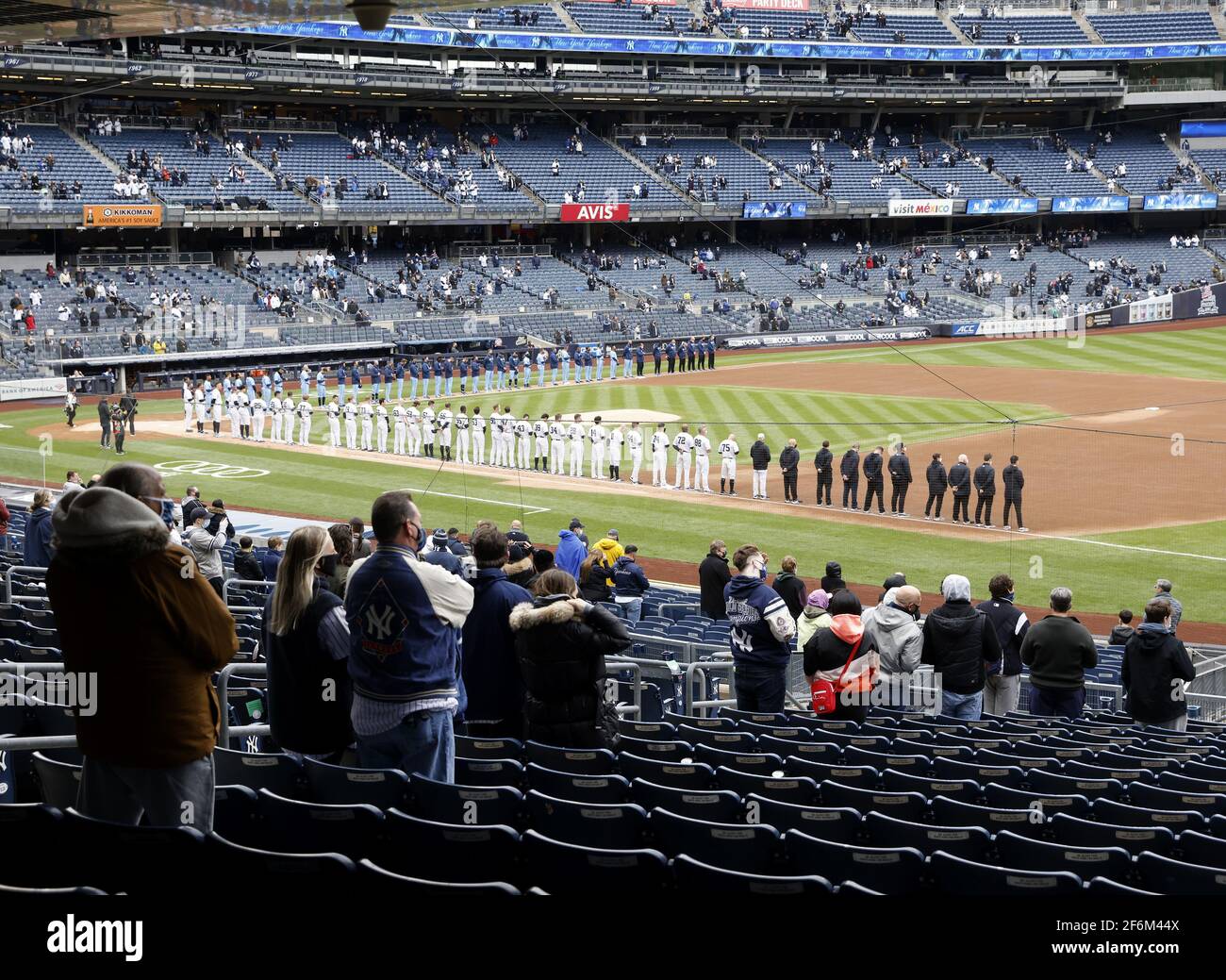 Bronx United States 01st Apr 21 New York Yankees And Toronto Blue Jays Players Line Up On The Baselines For The National Anthem In The 21 Mlb Opening Day Baseball Game At