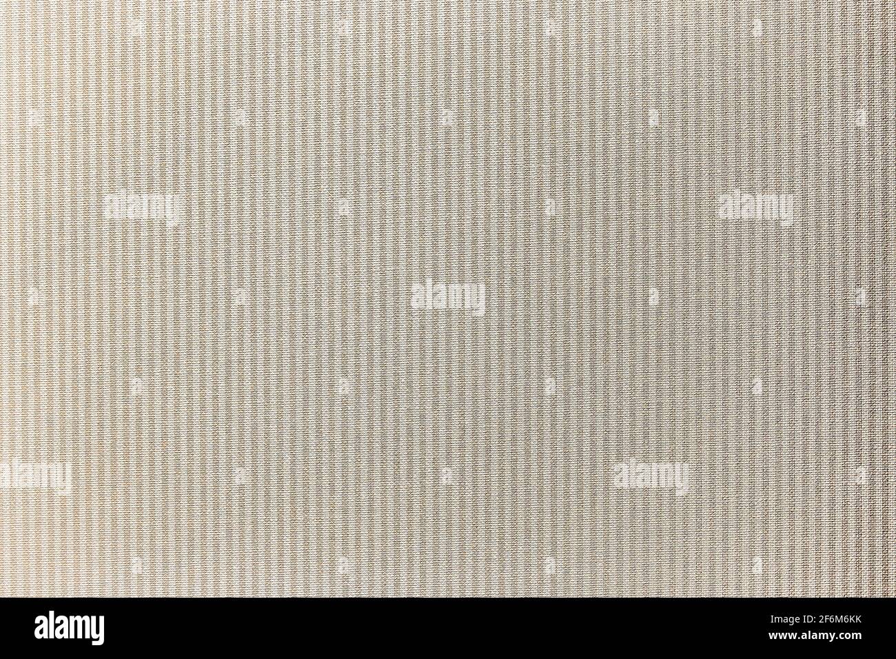 Texture of light beige abstract wallpaper with a pattern of vertical ...