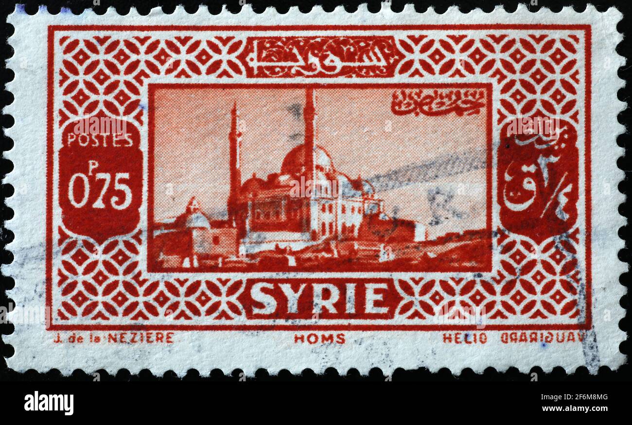 Ancient mosque on old syrian postage stamp Stock Photo