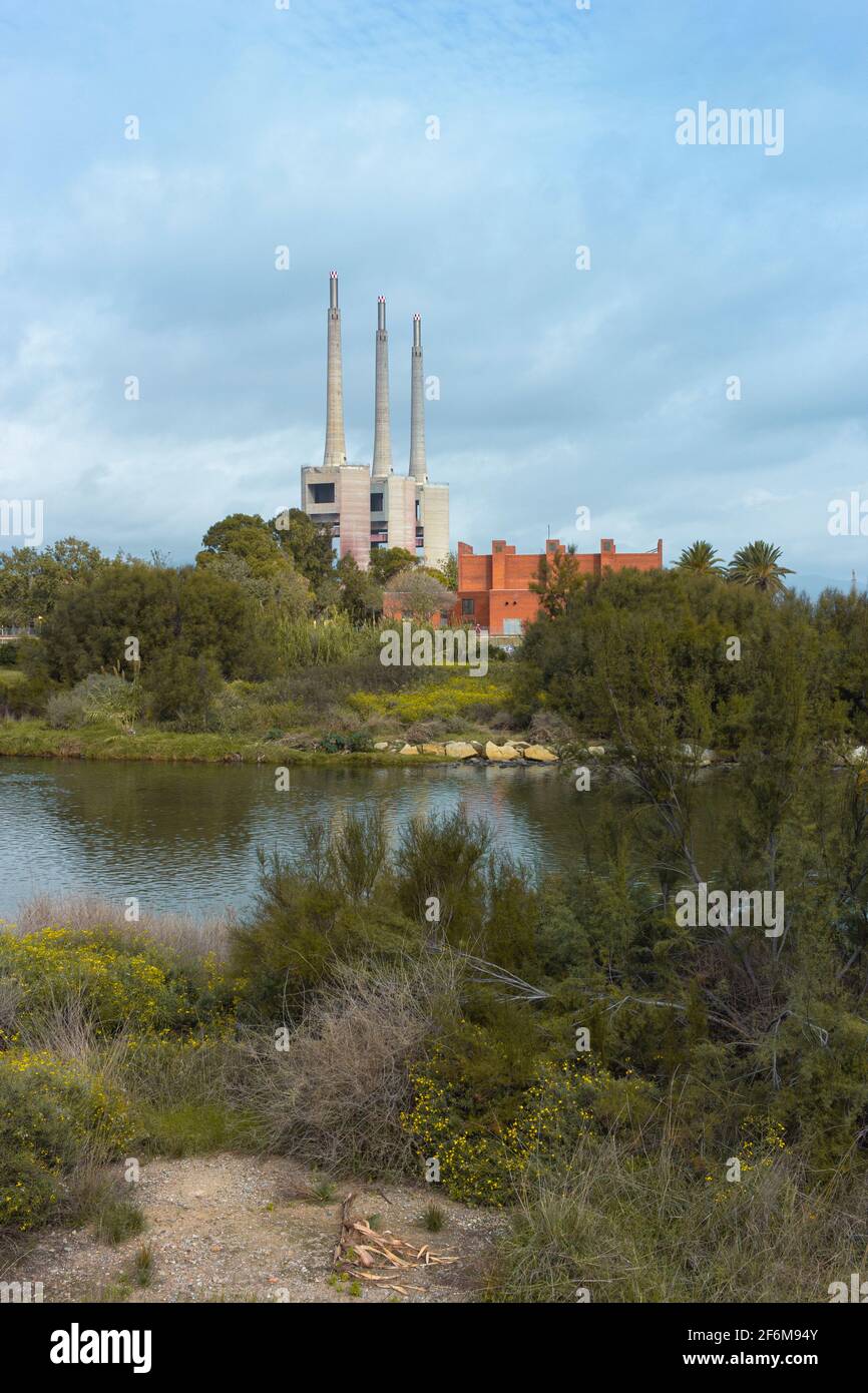 Landscape with an old disused thermal power station for the production of electric energy in Barcelona Spain Stock Photo