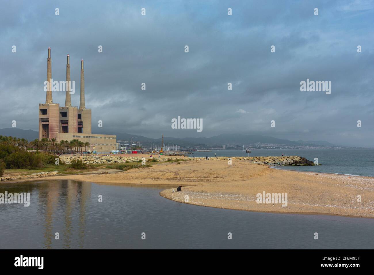 Landscape with an old disused thermal power station for the production of electric energy in Barcelona Spain Stock Photo