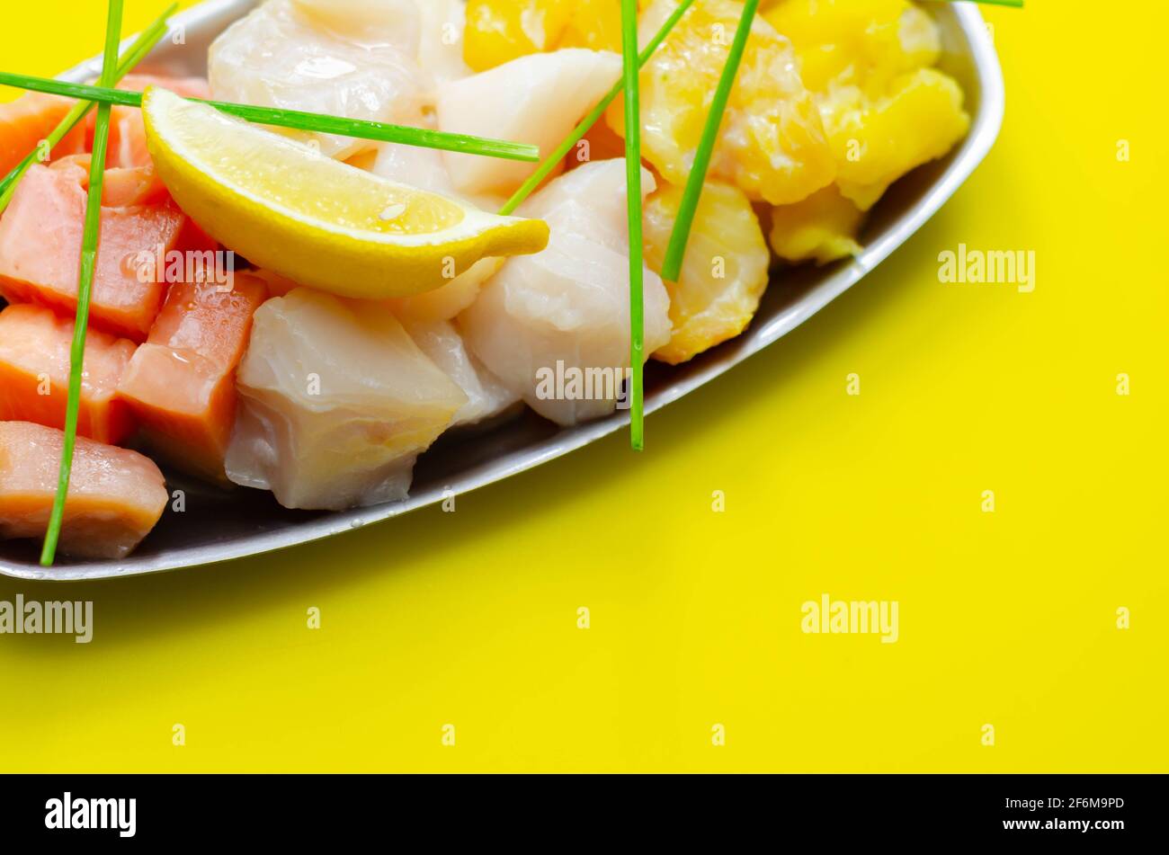 Fish pie mix, defrosted, skinless and boneless cod, dyed smoked haddock