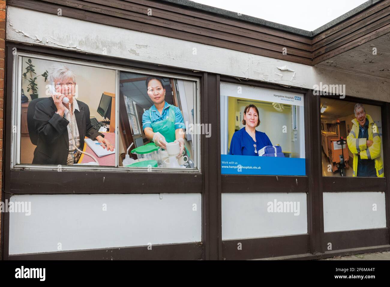 Recruitment posters for occupations in healthcare displayed on the exterior of an NHS building at Royal Hampshire County Hospital, Winchester, UK Stock Photo