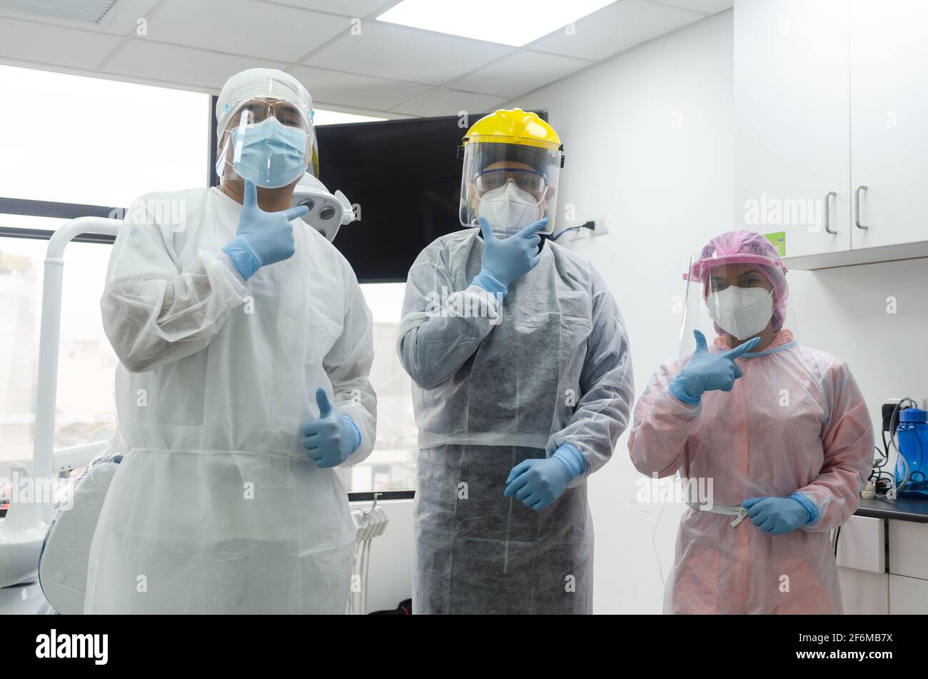 A group of doctors in protective suit against the virus. Stock Photo