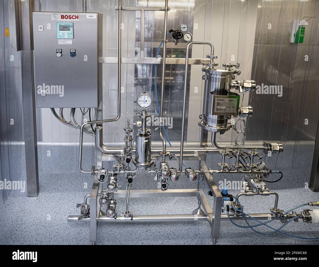 Photo of premises and equipment of pharmaceutical and chemical production. Formation, packaging, packing, Stock Photo