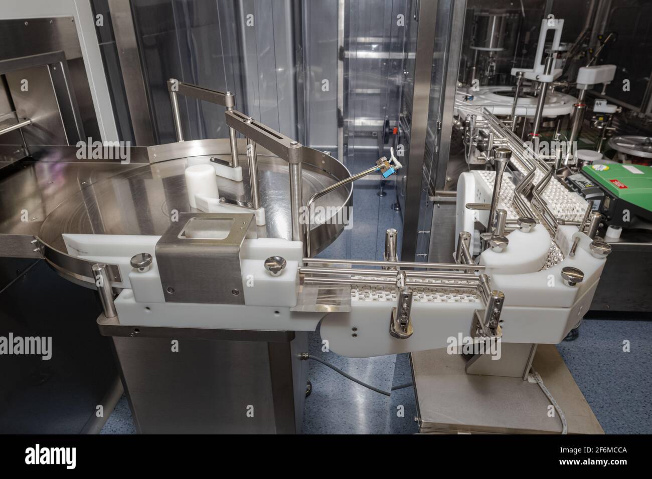 Photo of premises and equipment of pharmaceutical and chemical production. Formation, packaging, packing, Stock Photo