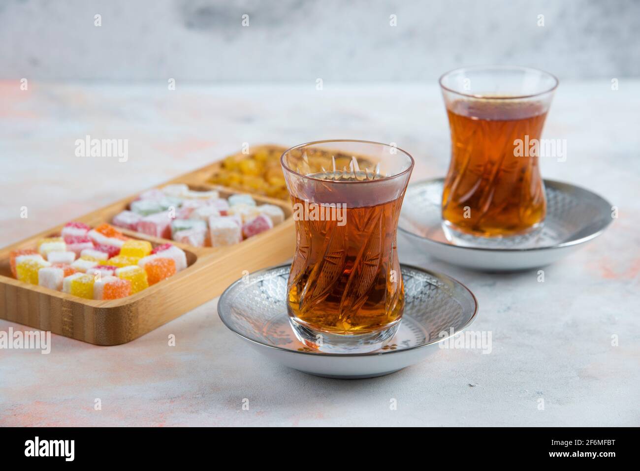 Close up photo of Two glass tea and turkish delights Stock Photo