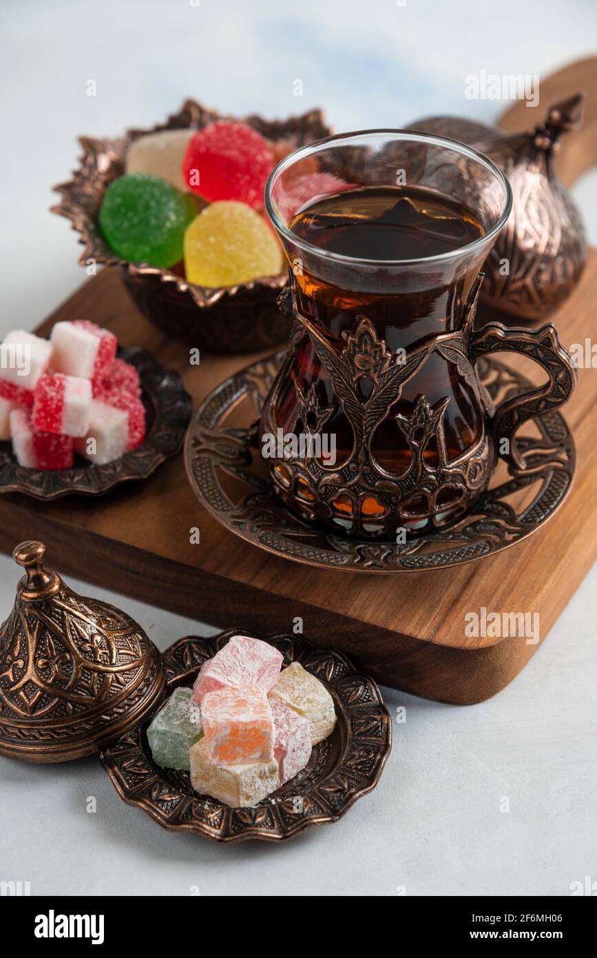 Close up photo of Tea set, Marmalade, Lokum and fragrant tea Stock Photo