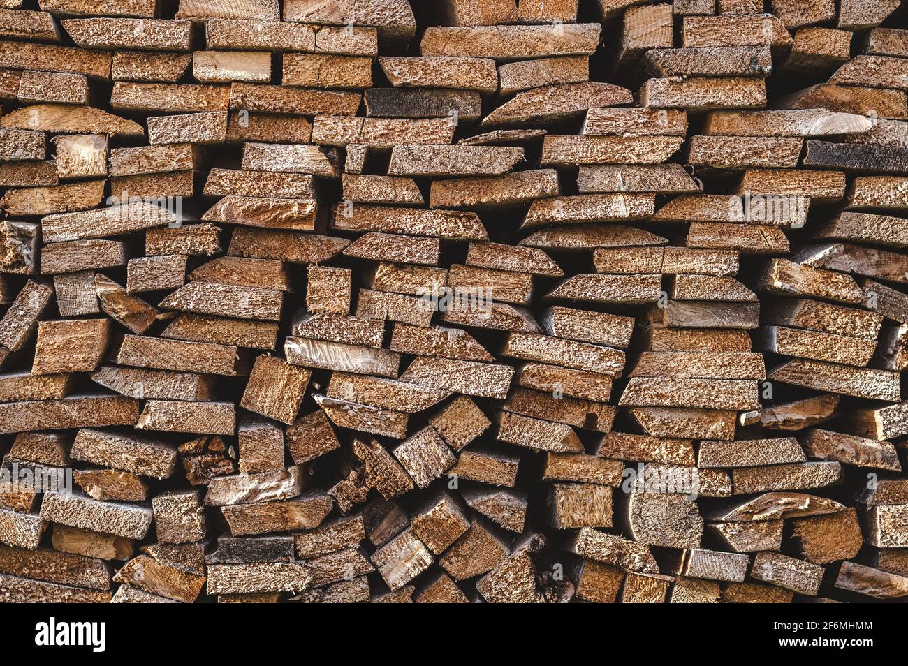 Stacked timber chopped wood board close-up, firewood background pattern ...