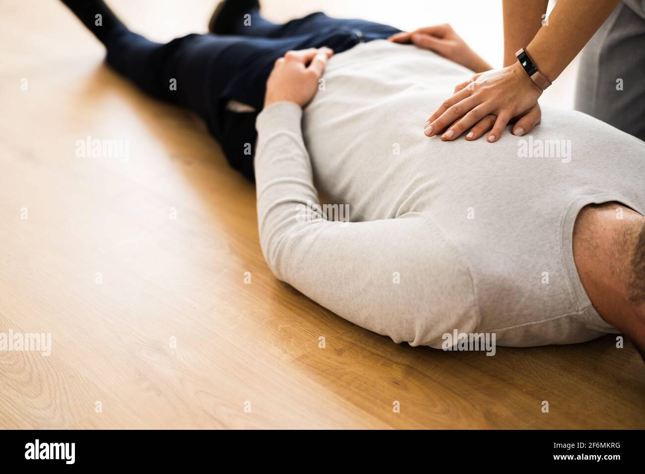 Unconscious CPR Rescue And Cardiopulmonary Ambulance Help Stock Photo