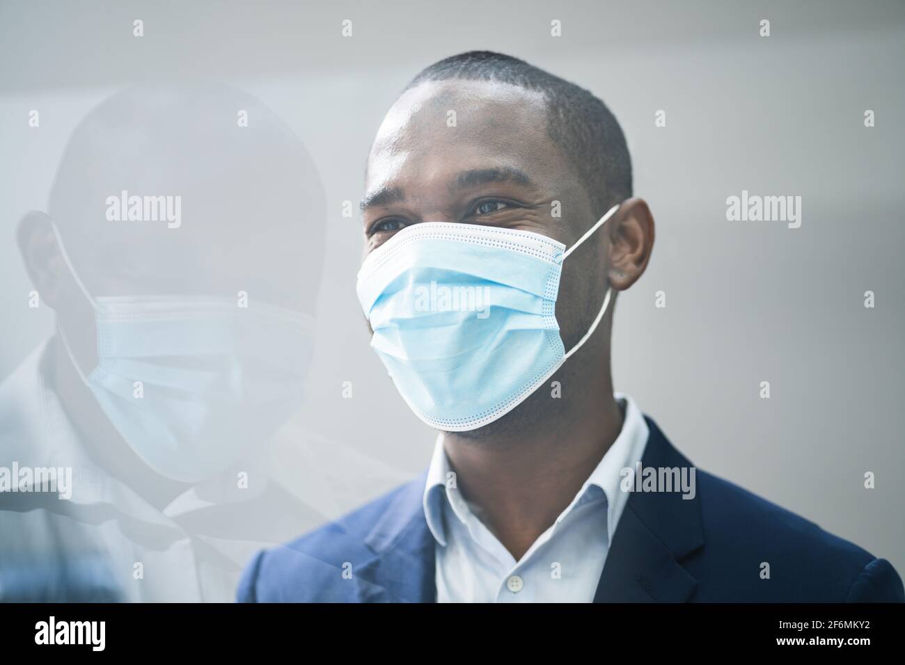 Black men wearing mask hi-res stock photography and images - Alamy