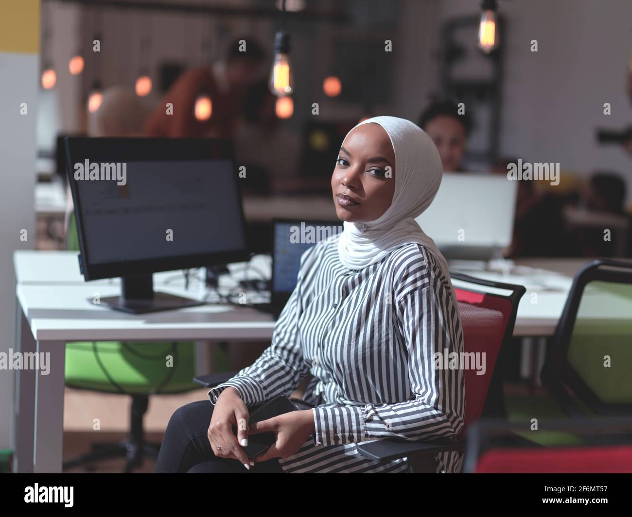 African muslim businesswoman portrait at office Stock Photo - Alamy