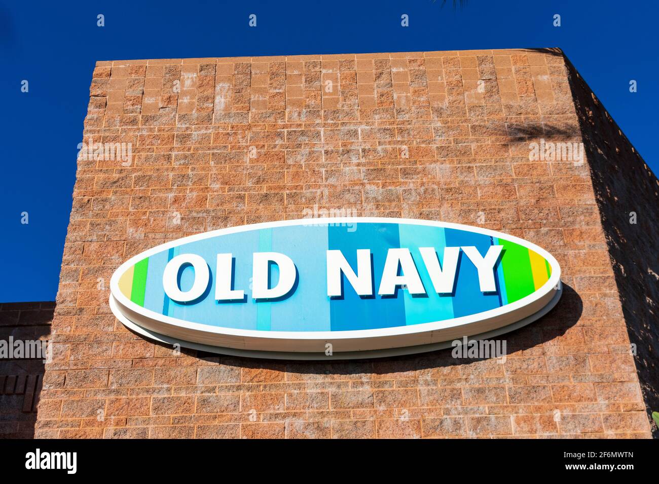 Old Navy logo and sign on chain store facade. Old Navy is an American clothing and accessories retailing company - Irvine, California, USA - 2020 Stock Photo