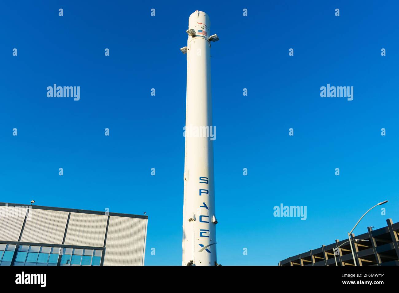 Falcon 9 rocket booster at SpaceX, Space Exploration Technologies Corp, headquarters building. SpaceX is a private American aerospace manufacturer - H Stock Photo