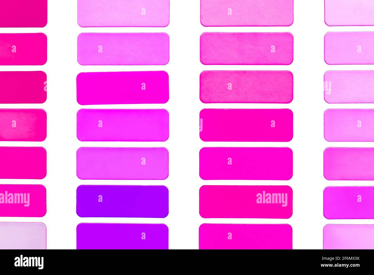 Samples of purple and pink, different shades of violet on a white background, isolated, closeup