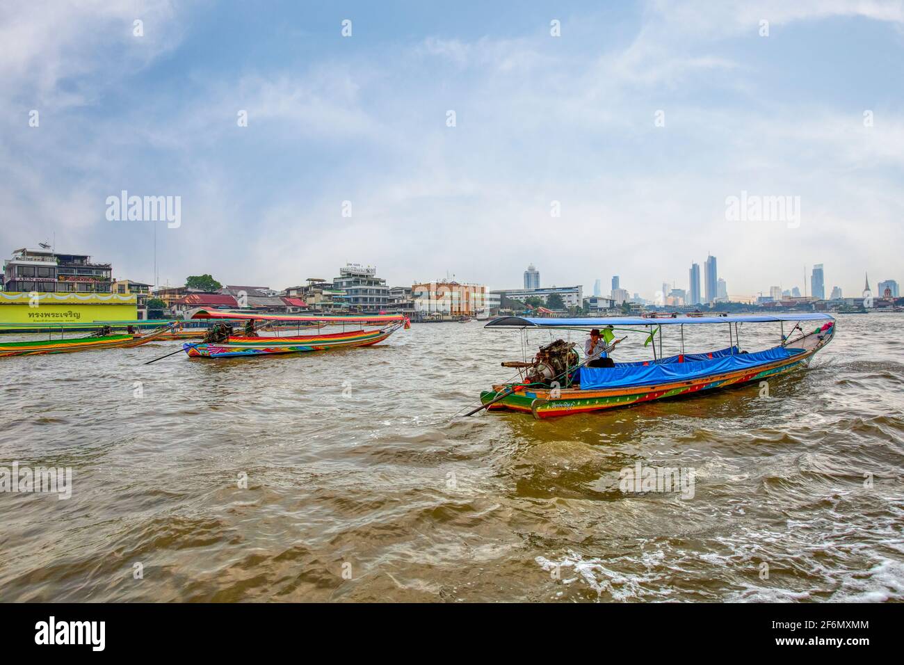 traditional thai long boat on the Chao Phraya River in Bangkok ...