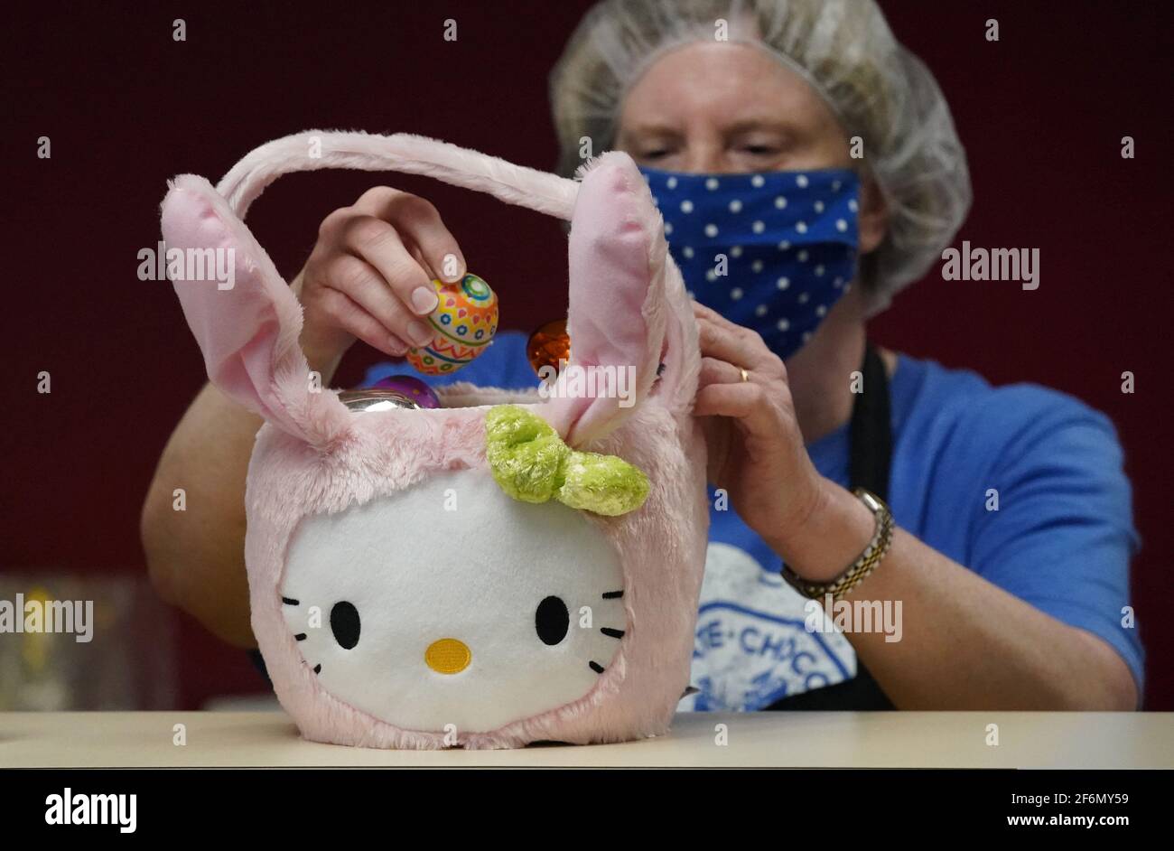 St. Louis, United States. 01st Apr, 2021. Worker Lynn Schaefer fills a