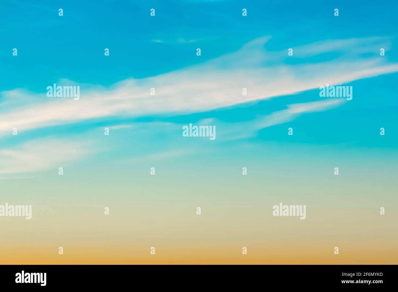 Morning blue sky with clouds and an orange gradient before dawn Stock Photo Alamy