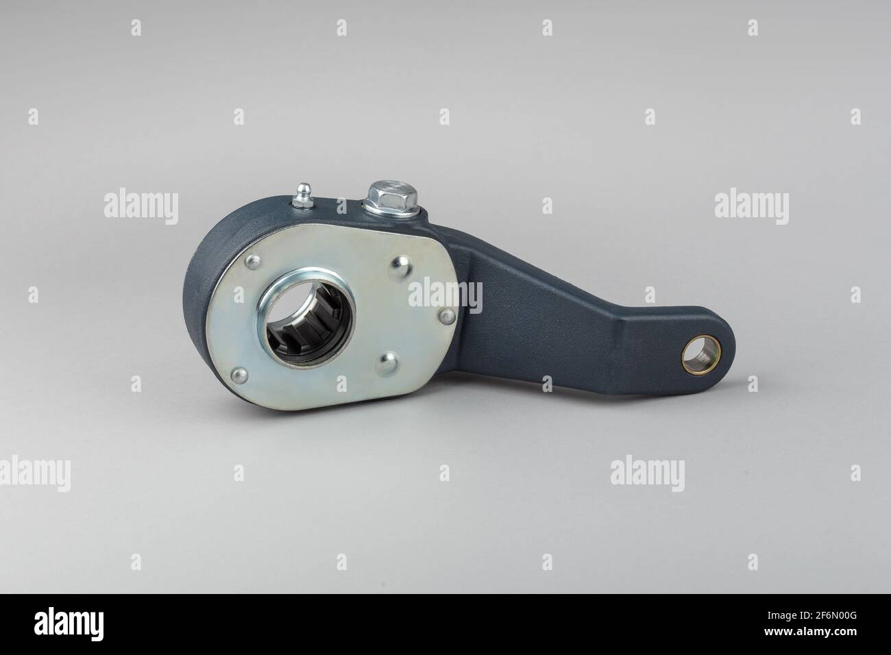 Slack adjuster.Brake slack adjuster on the gray background. Truck parts