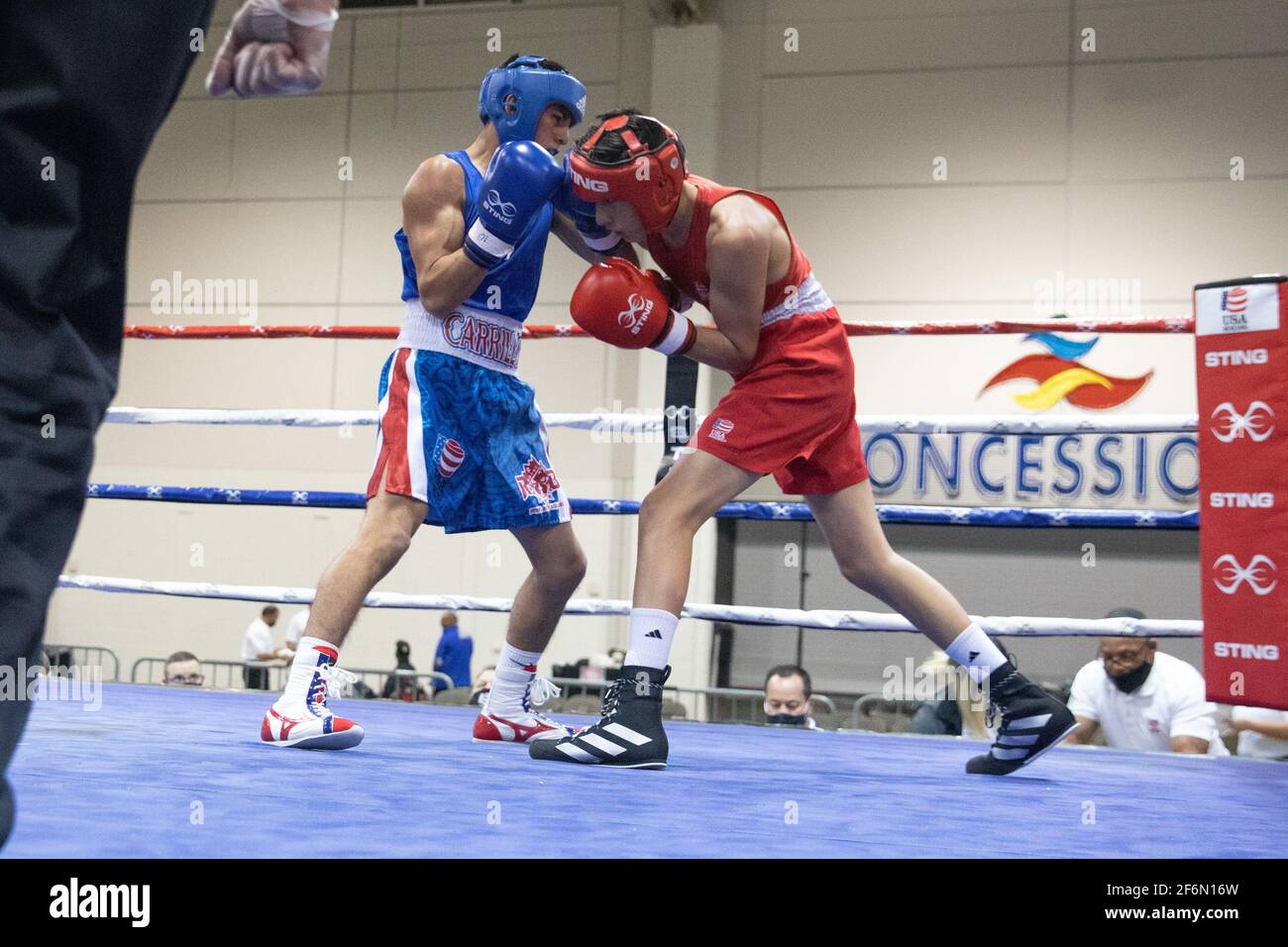 Shreveport, Louisiana, USA. 31st Mar, 2021. Eugene Hill of Dickinson, TX fights Ralph Clemente of Ronkonkoma, NY on day 6 of the 2020 USA Boxing National Championships in Shreveport, LA. Credit: Allyse Pulliam/ZUMA Wire/Alamy Live News Stock Photo