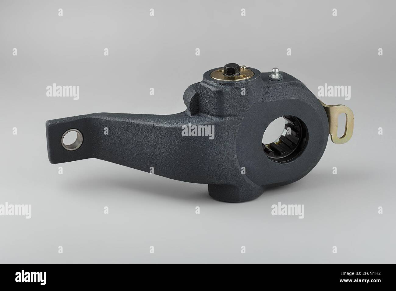 Slack adjuster.Brake slack adjuster on the gray background. Truck parts