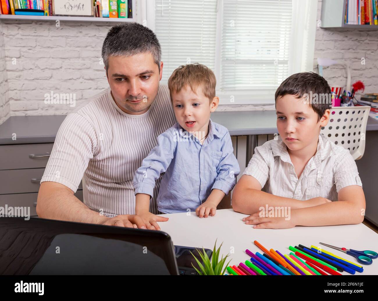 Happy family are having video call using laptop. Homeschooling Stock ...