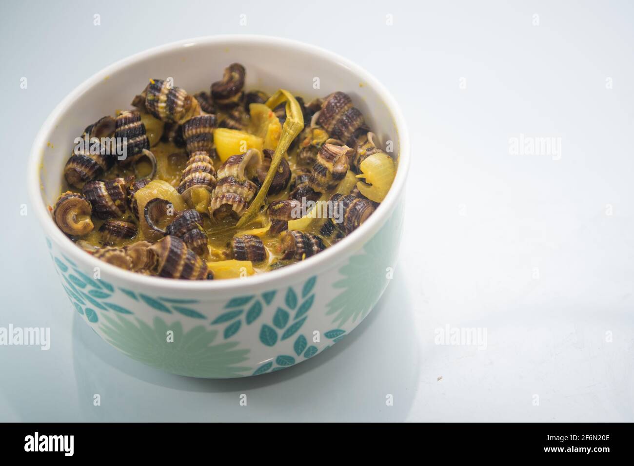 Sea snail traditional Malay dishes in coconut cream or ' Siput sedut