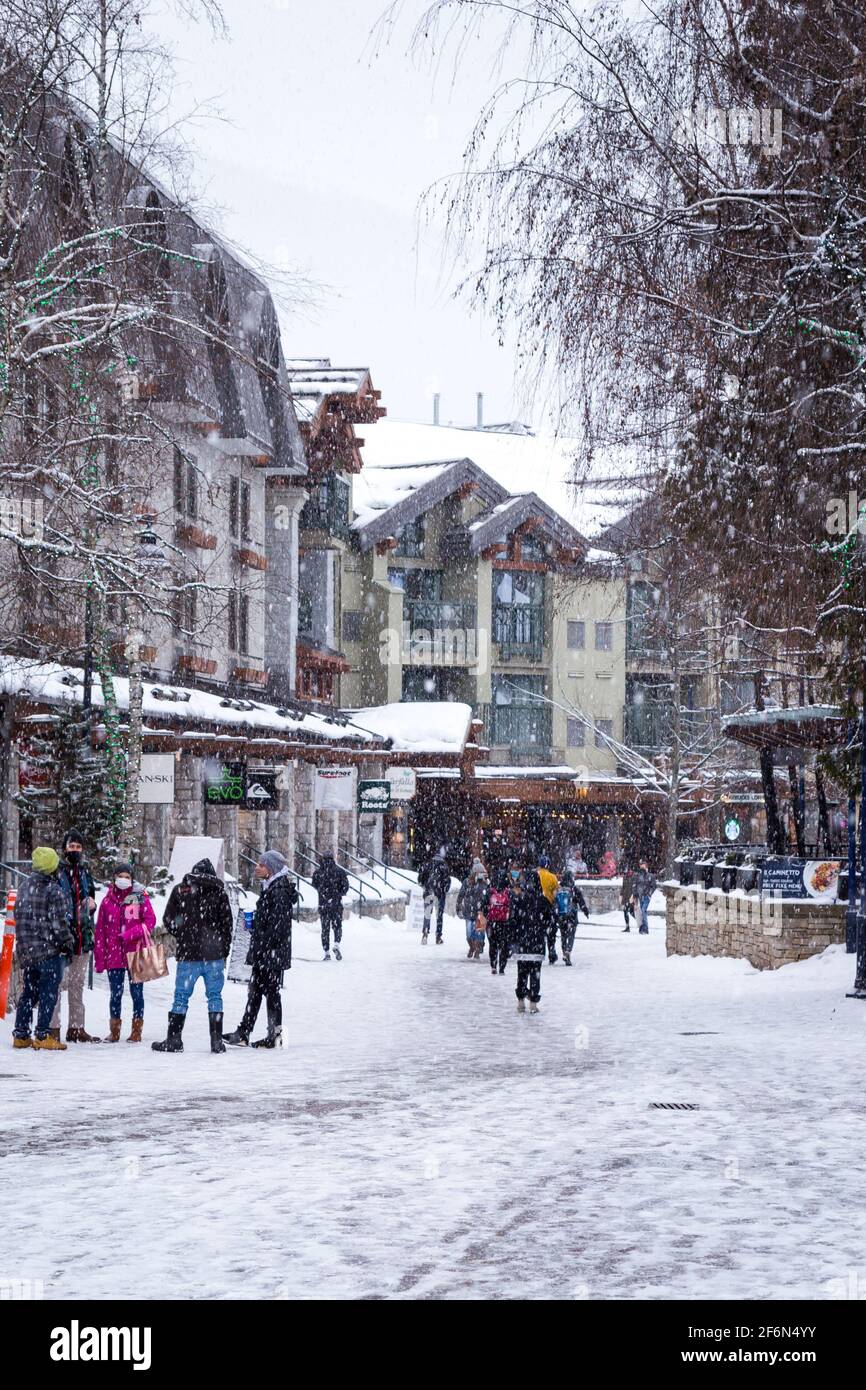 WHISTLER, BC, CANADA - FEB 28, 2021: Whistler Village with people during the Covid 19 pandemic. Stock Photo