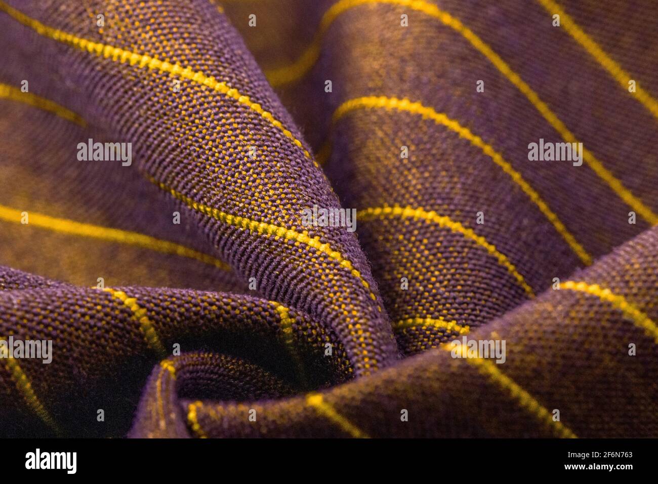 Texture, background, template. Silk other Cotton fabric black and red, silk other Cotton drapery. In closeup, threads of fabric and a pattern of textu Stock Photo