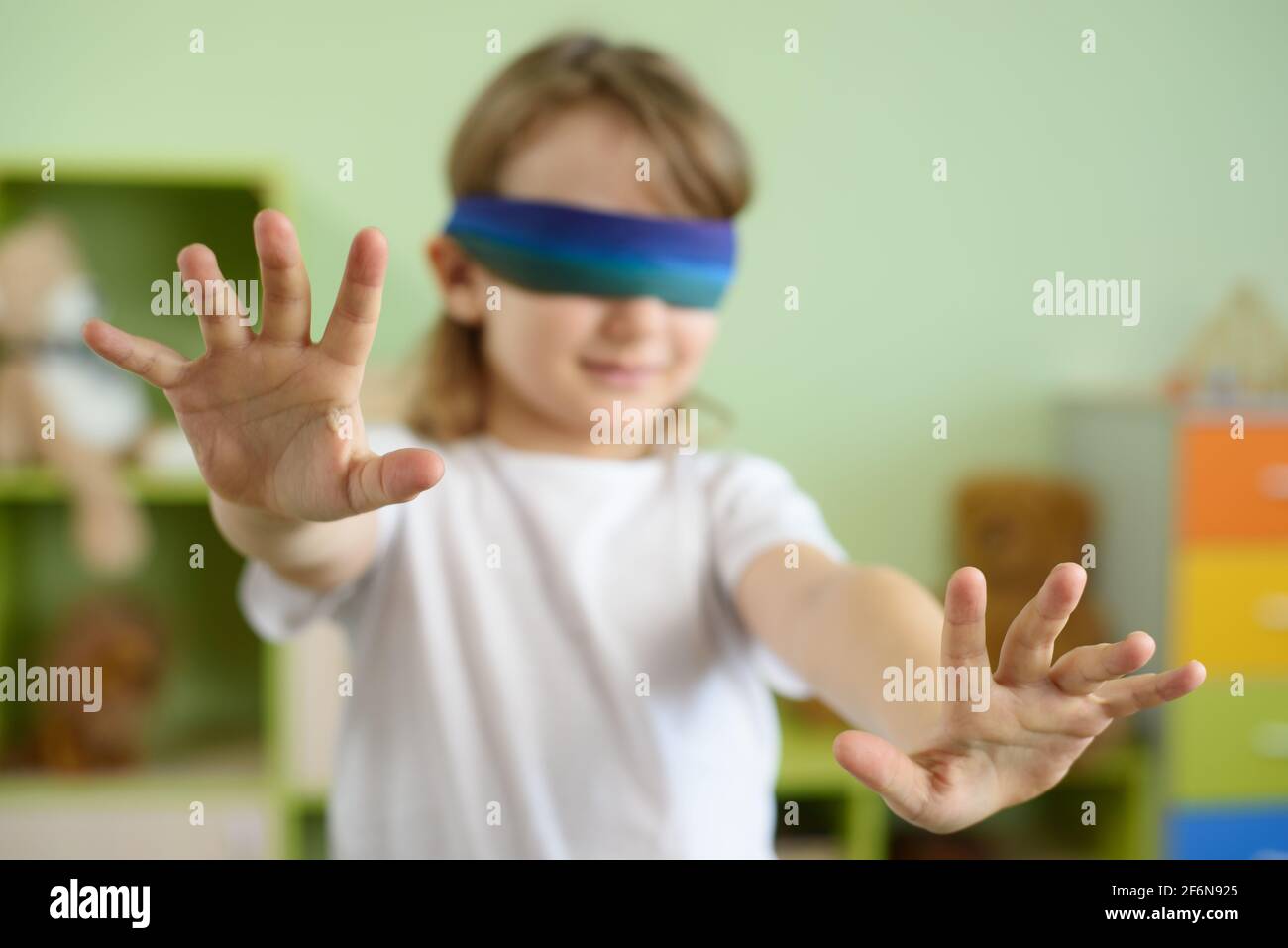 Blindfold game child hi-res stock photography and images - Page 2 - Alamy