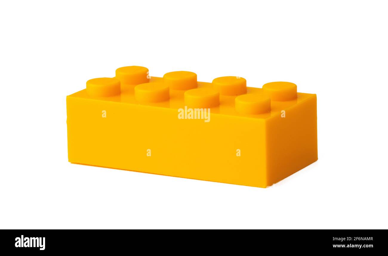 Orange plastic building blocks isolated on white Stock Photo