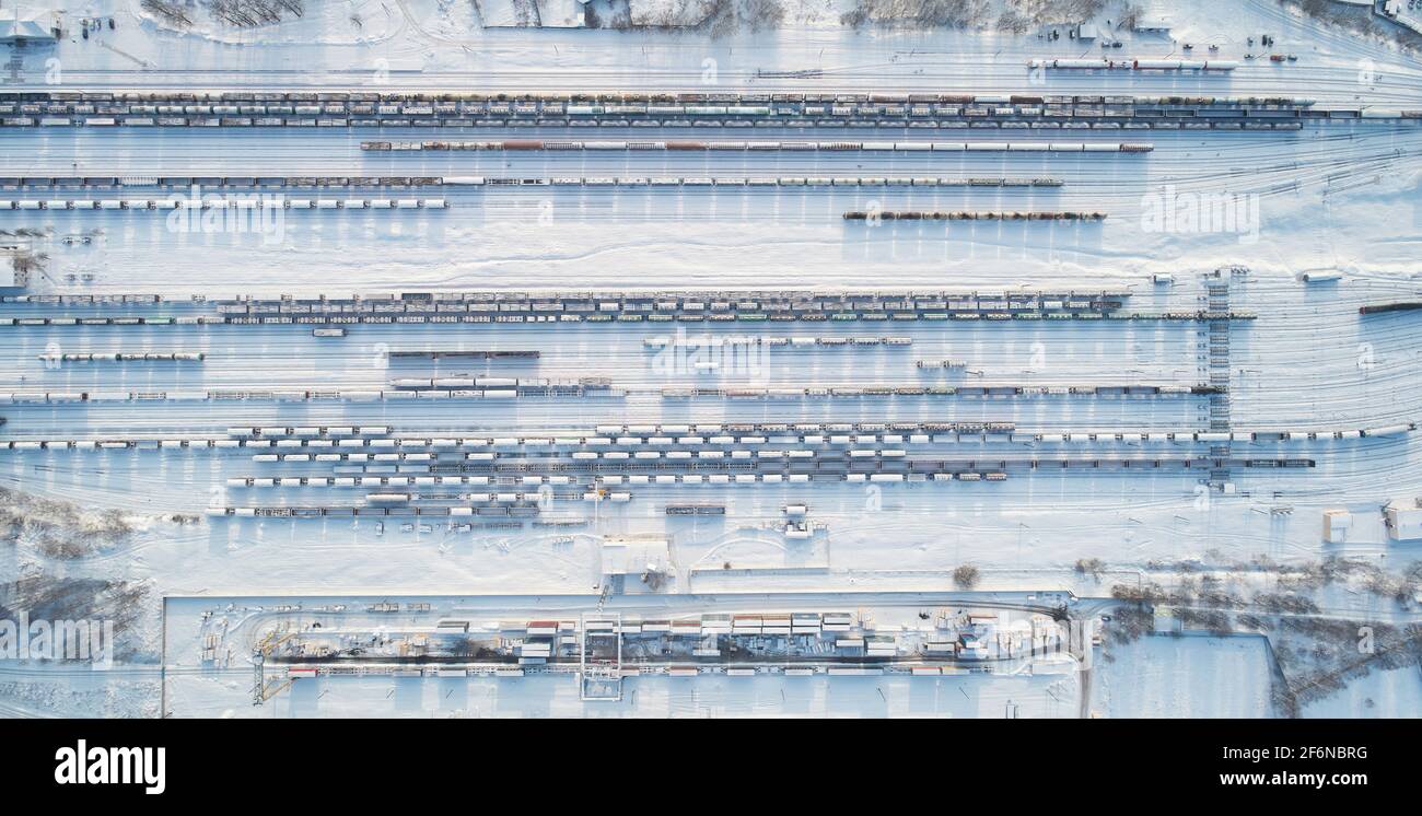 Railroad hub above top view in winter time. Freight terminal Stock Photo