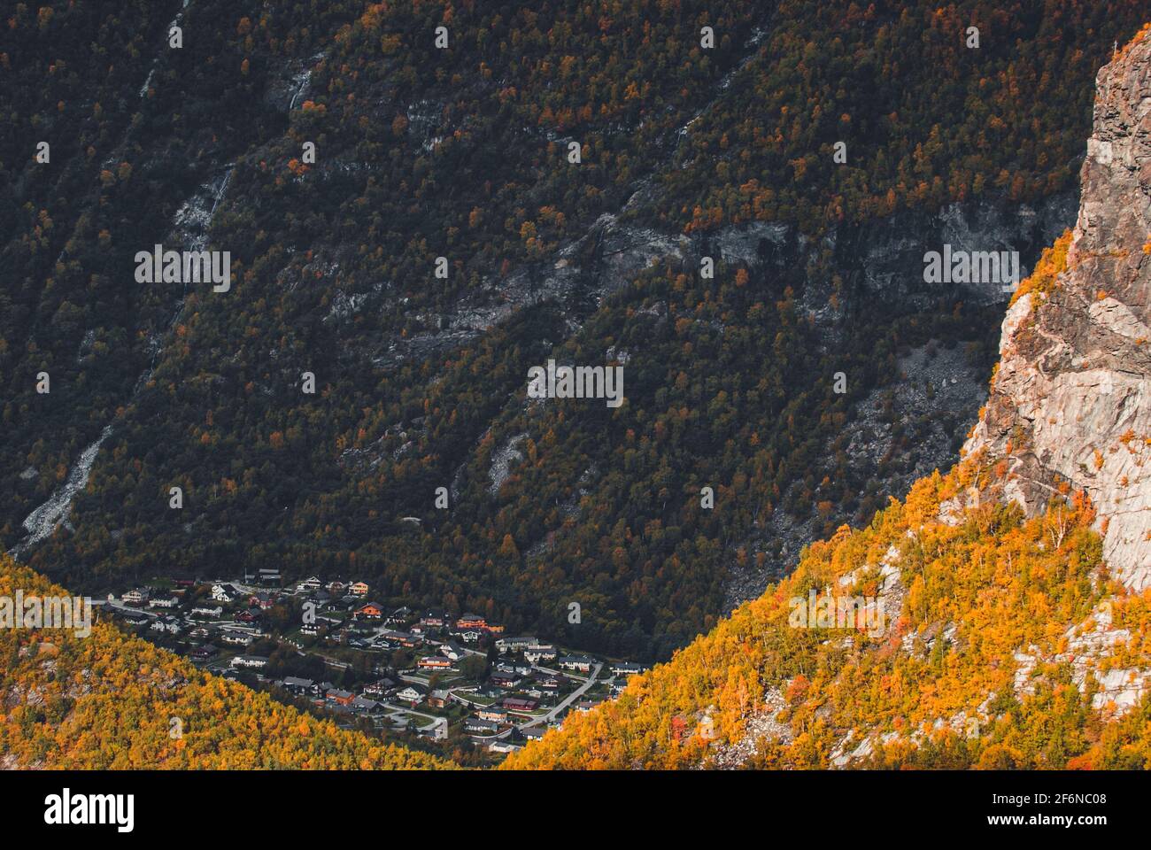 Village in valley surrounded by mountains Stock Photo - Alamy
