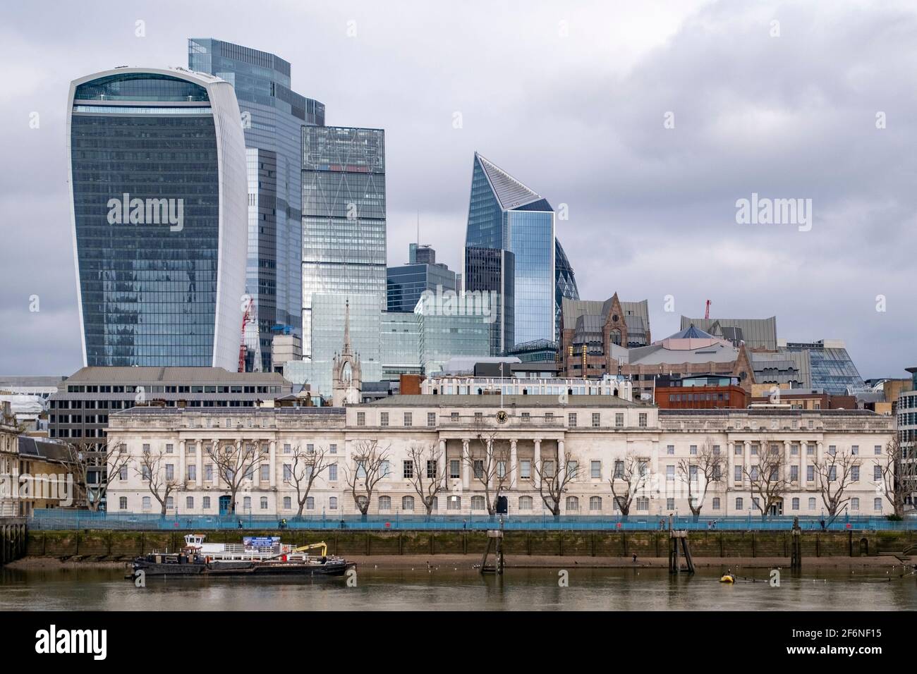 View of the City of London central financial district from Southwark, with the Customs House building. Stock Photo