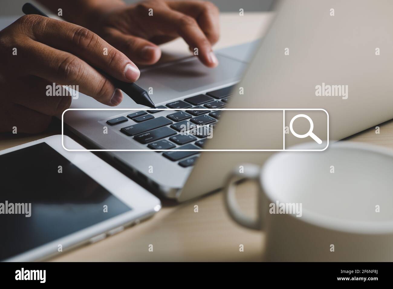 businessman using Searching Browsing Internet of things (IoT) internet network for Searching Browsing Internet Data Stock Photo