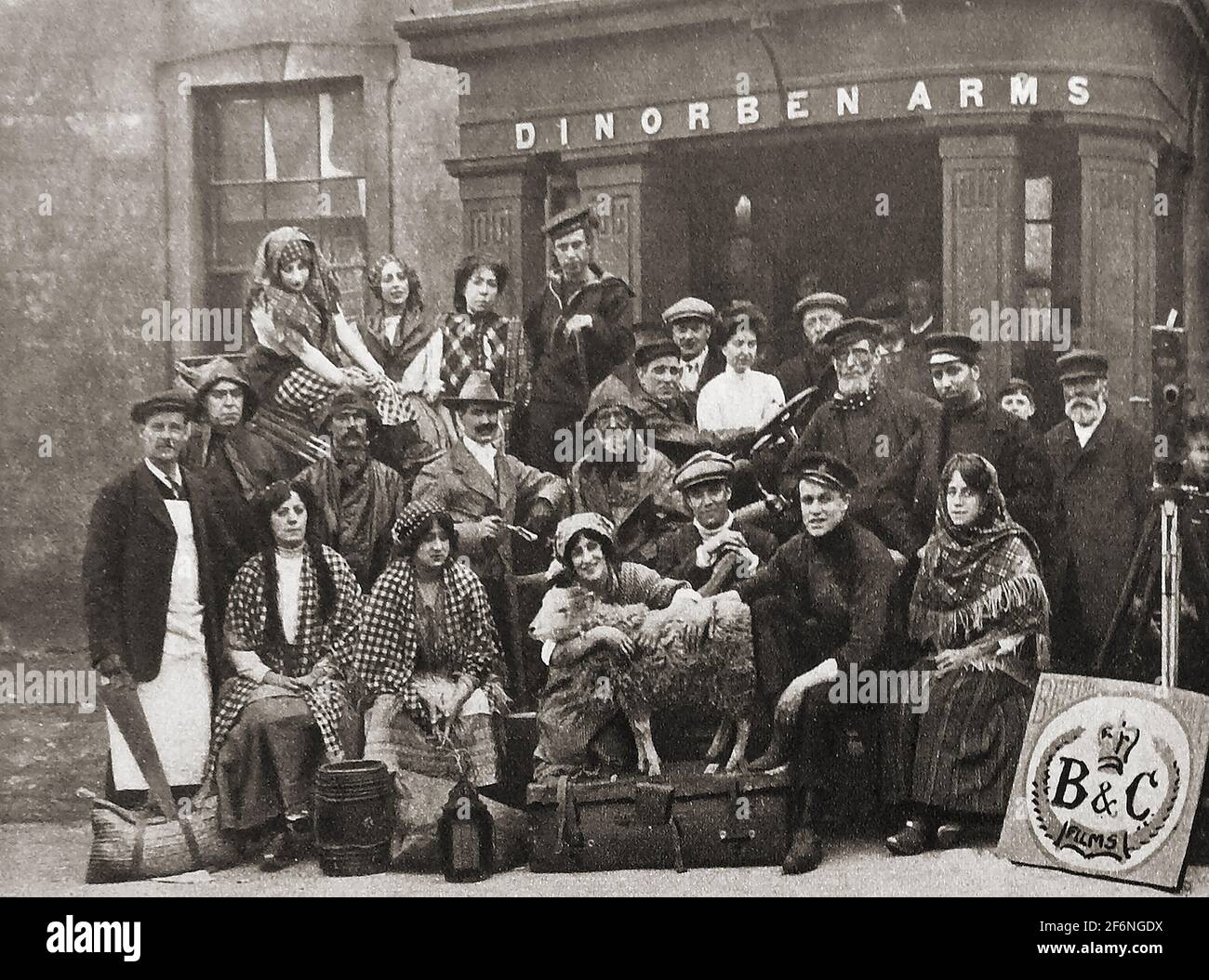 Film making in Britain prior to WWI. Actors from B & C films gather for a photo shoot in 1914 outside the Dinorben Arms. British & Colonial Films was a British company making mostly silent films in London 1908 -1924.  Later in 1908 The British and Colonial Kinematograph Company was formed in 1908 by Albert Henry ('Bert') Bloomfield (c.1882–1933) & John Benjamin ('Mac') McDowell (1878–1954). Operating from a rented basement in central London, they used only one camera and developed the negatives in McDowell's house. Later they  moved to their own studio at Newstead House ,East Finchley, London. Stock Photo