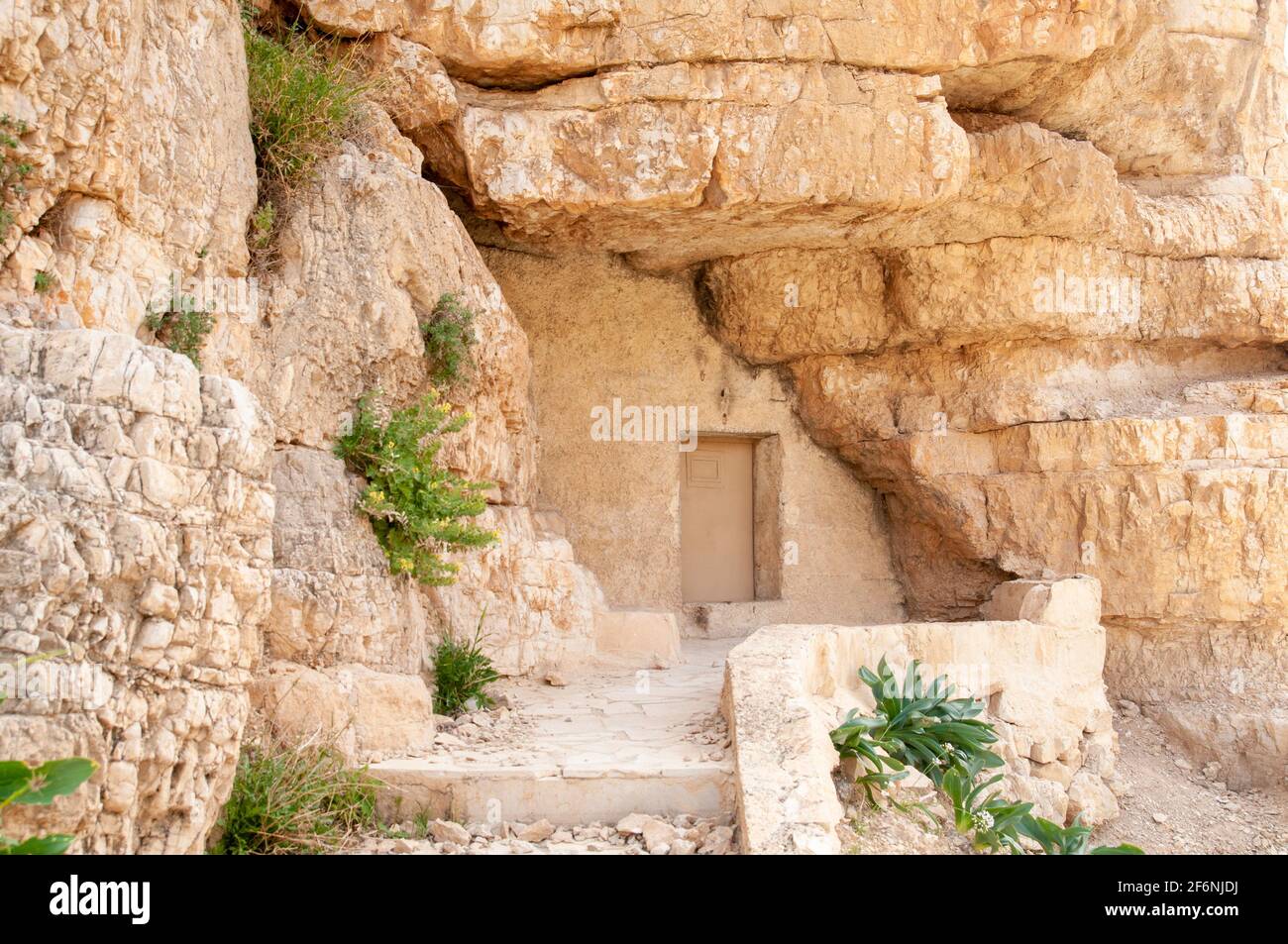 This Hermit's cave at Saint Sabbas, was used by Sabbas the Sanctified in 483. Mar Saba is now a Greek Orthodox monastery overlooking the Kidron Valley Stock Photo