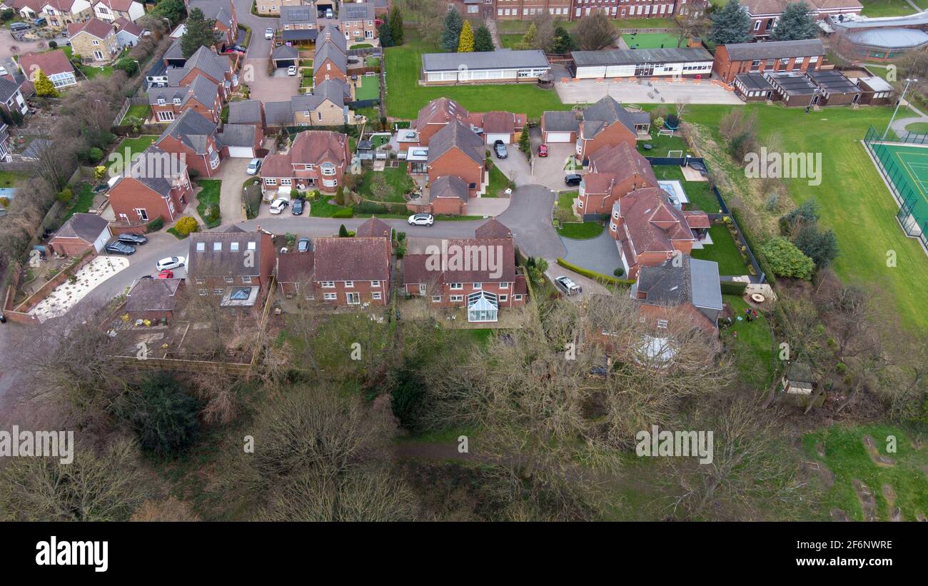 Aerial photo of a typical residential housing estate in the UK, taken