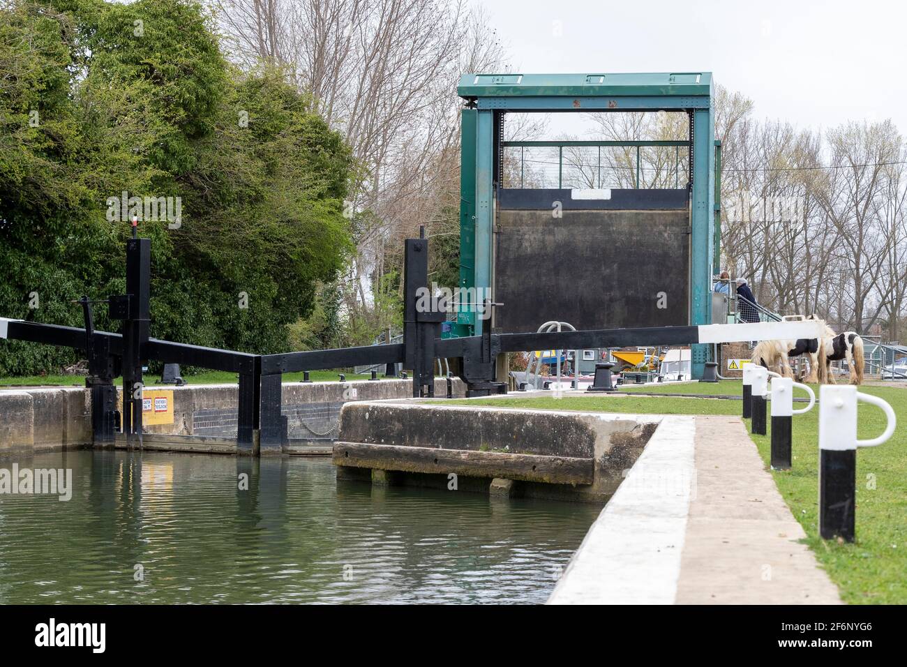 Lock gates on the river Nene near the Northampton boat club on a dull spring morning, Nene Valley, Northamptonshire, England, UK. Stock Photo
