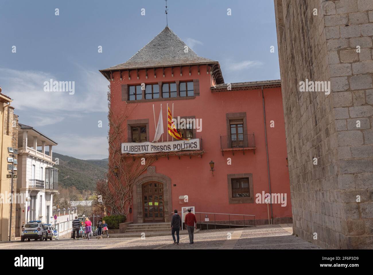 LA SEU D URGELL, CATALONIA - 2021 APRIL 3: People in the Catalan town in April 3 in La Seu d Urgell, Catalonia. Town is located in Catalan Pyrenees. Stock Photo